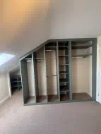Reed green fitted wardrobe interior with shelving and hanging, fitted in Richmond